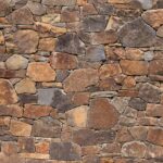 Piedras detail,of,a,stone,wall,with,different,size,of,rocks.