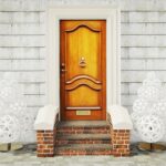 Navidad vintage,door,and,two,decoration,fir tree,near,wall